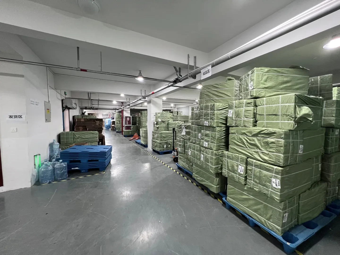 Shipping area with pallets of packed orders ready for worldwide dispatch